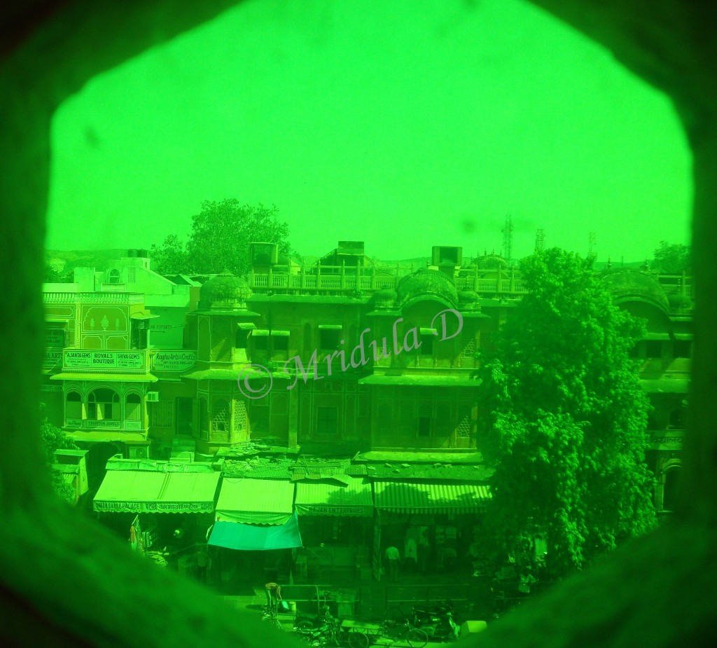 Jaipur City and the sky through Colored Hawa Mahal Glasses