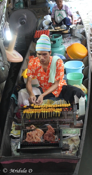 Preparing Food in a Boat, Taling Chan Floating Market, bangkok
