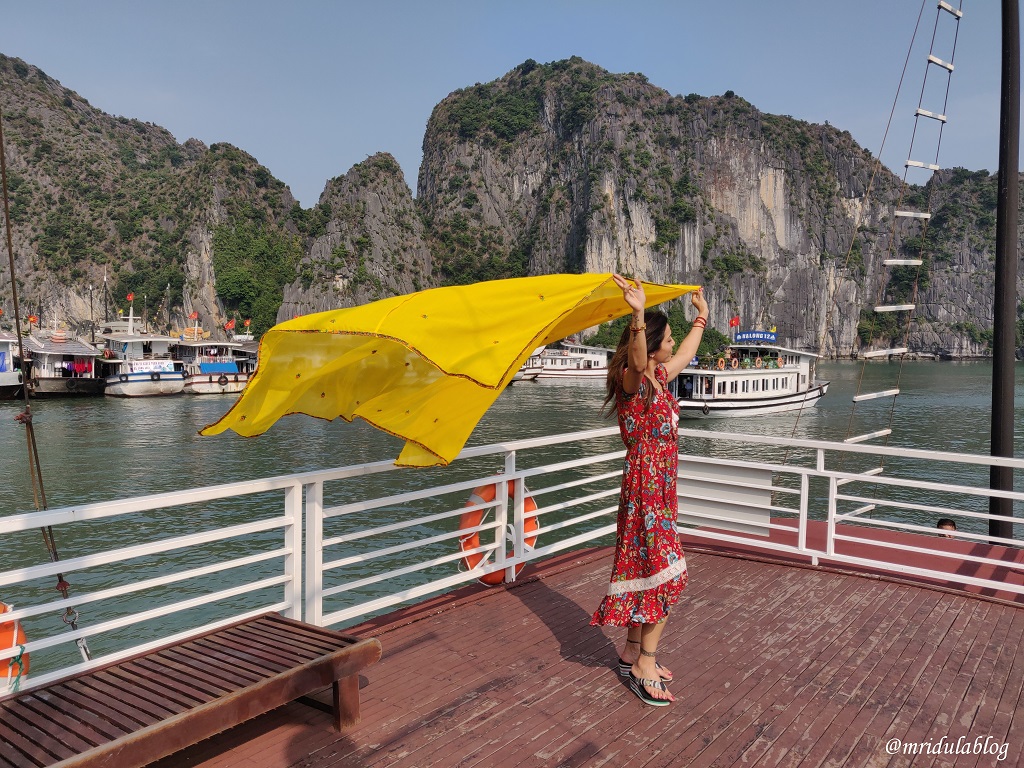 Woman wearing a pretty dress at Ha Long Bay Cruise