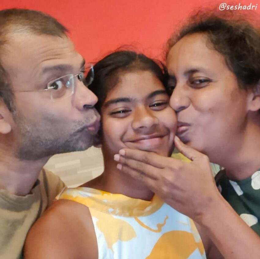 An Indian daughter with her parents