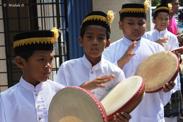 Children Playing Music at Sungai Pasu in Malaysia