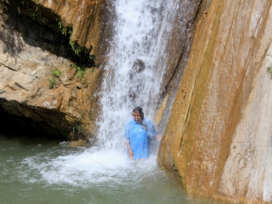 Standing Beneath a Waterfall