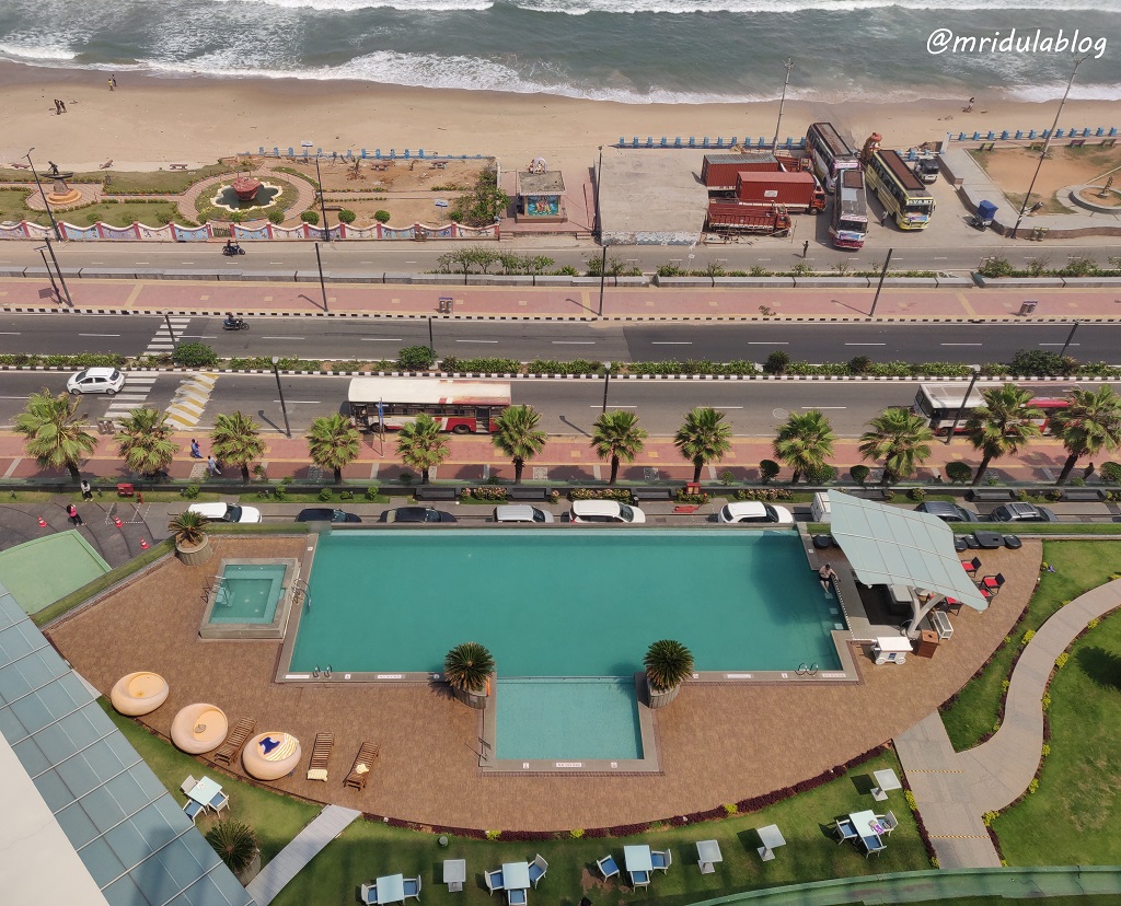 The Swimming Pool and the Ocean beyond at Novotel Vizag